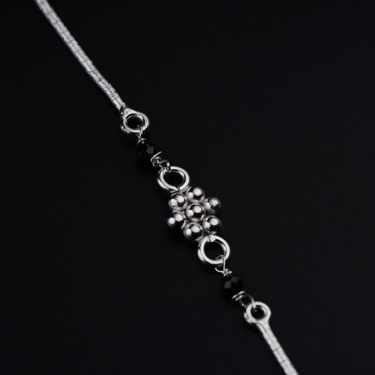 Silver mangalsutra with kudi and infinity motif